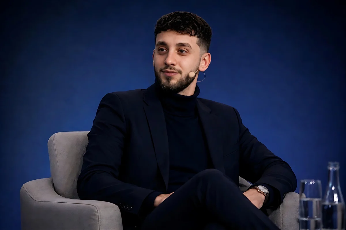Ilir Laro speaking on a panel
